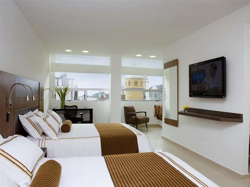 San Simon Hotel Pereira By Soratama Экстерьер фото A room at the hotel