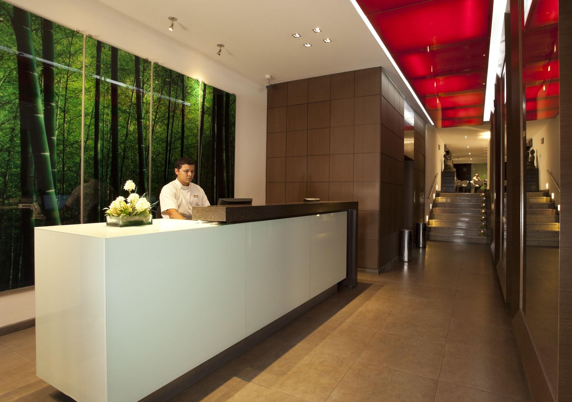 San Simon Hotel Pereira By Soratama Экстерьер фото The reception area of the hotel