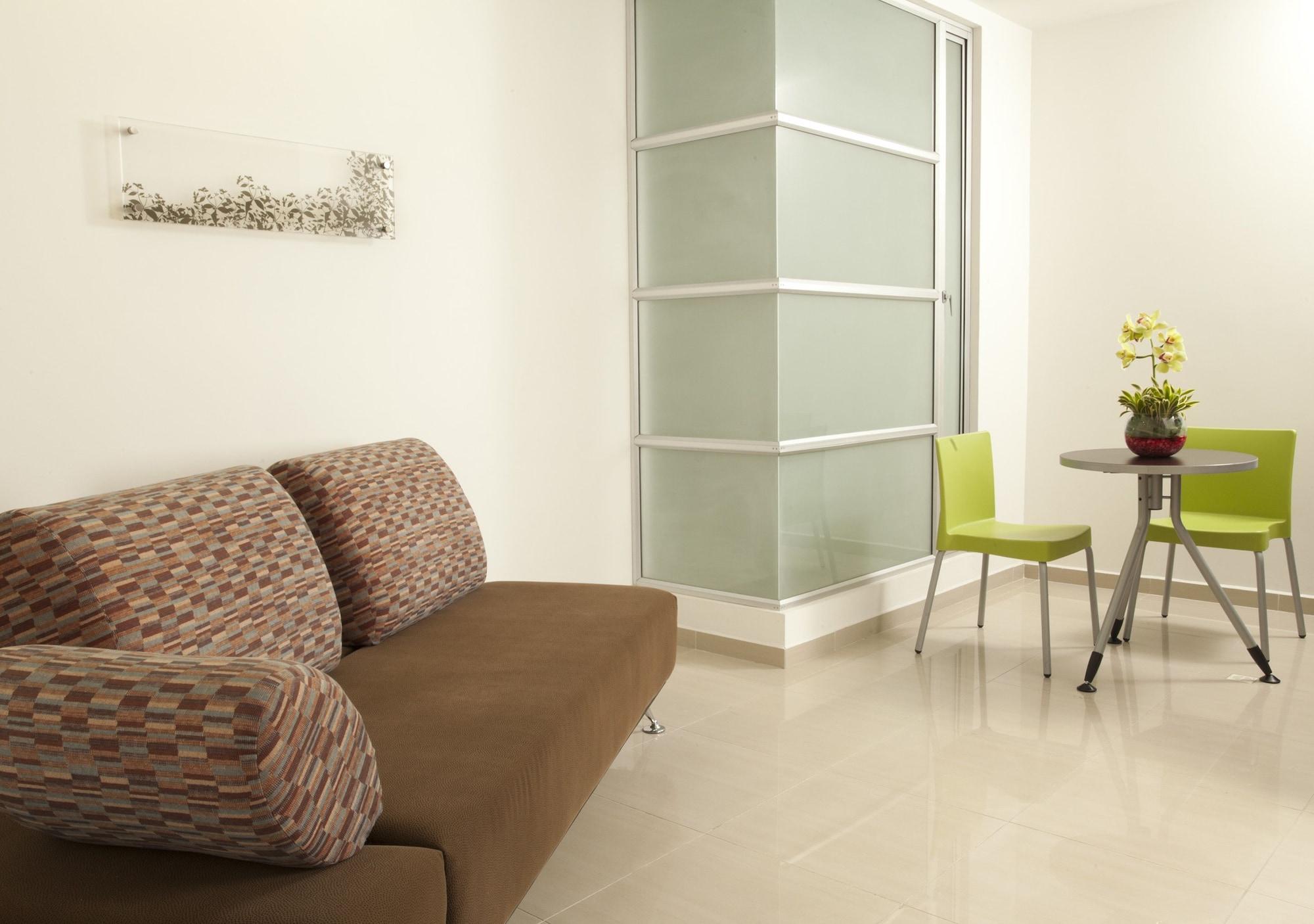 San Simon Hotel Pereira By Soratama Экстерьер фото A room with a vinyl floor