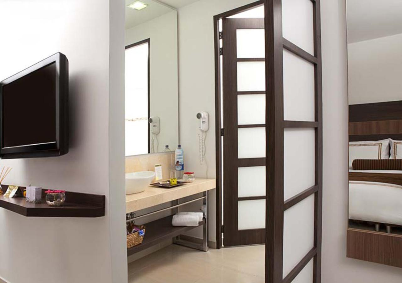 San Simon Hotel Pereira By Soratama Экстерьер фото A room at the hotel