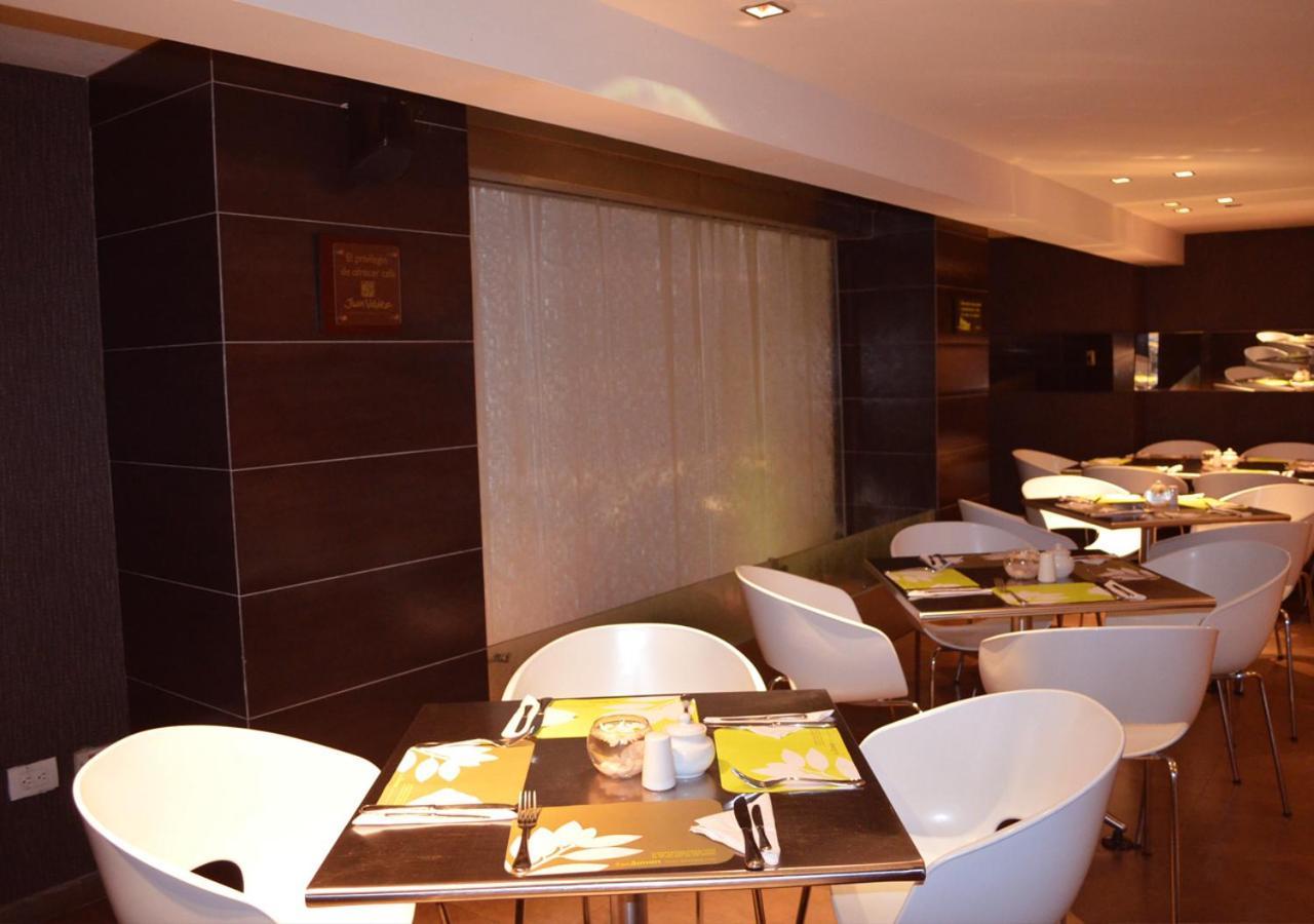 San Simon Hotel Pereira By Soratama Экстерьер фото The interior of the restaurant