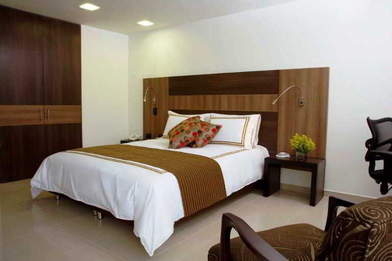 San Simon Hotel Pereira By Soratama Экстерьер фото A bedroom